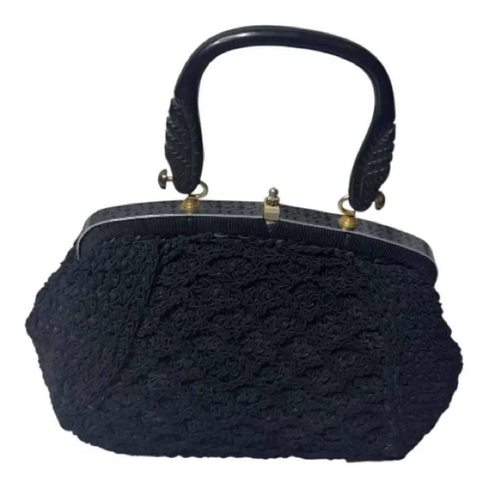 Vintage 60’s Black Knit Dumpling Bag With Silver And Gold Fixtures.